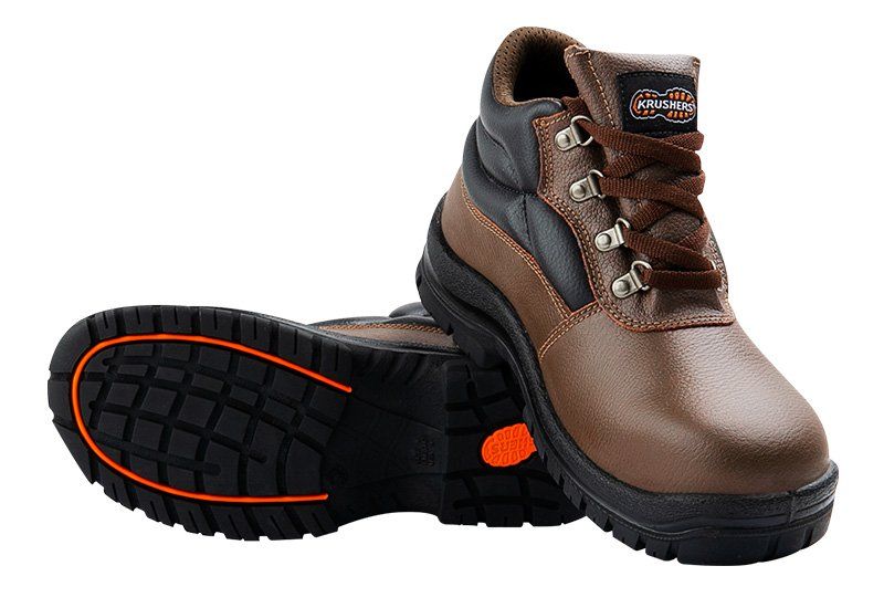 A pair of brown and black safety boots on a white background
