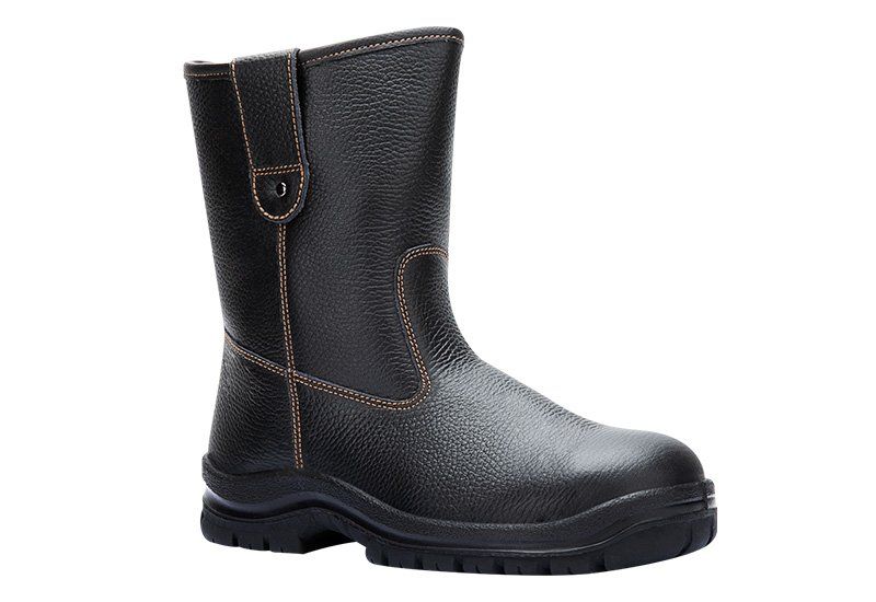 A pair of black safety boots on a white background.