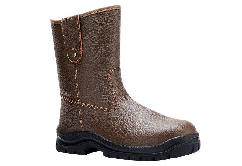 A pair of brown leather safety boots on a white background.