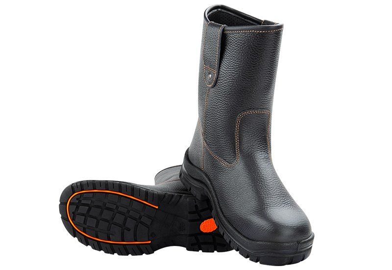 A pair of black boots with an orange sole on a white background.