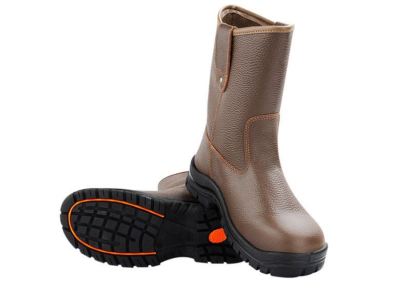 A pair of brown boots with a black sole on a white background.