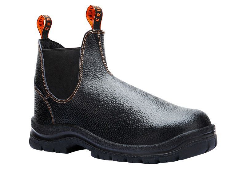 A pair of black and orange safety boots on a white background.