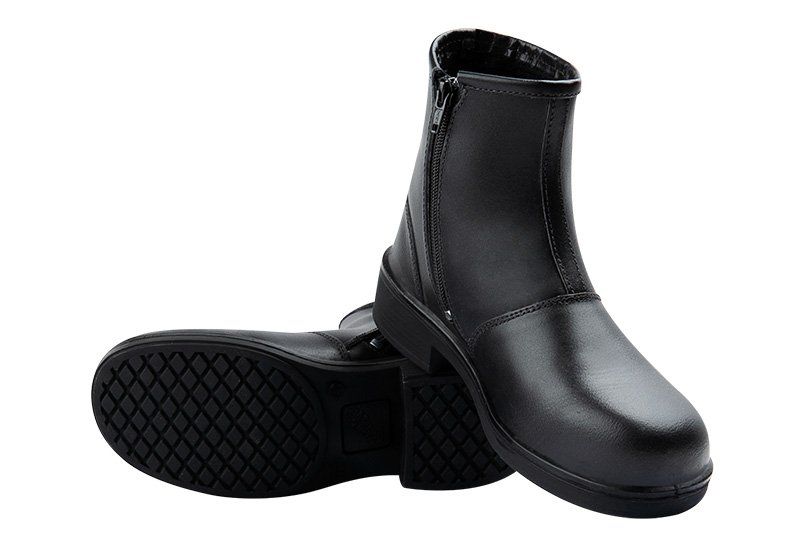 A pair of black boots with a zipper on the side on a white background.