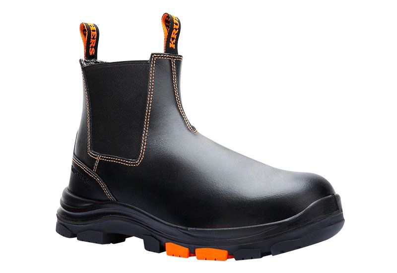 A pair of black and orange safety boots on a white background