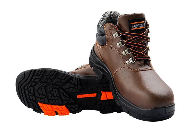 A pair of brown and black safety boots on a white background.