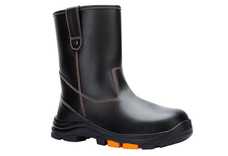 A pair of black and orange safety boots on a white background.