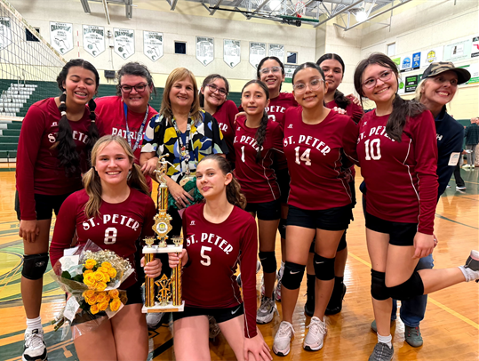 Catholic Youth Sports volleyball team holding a trophy