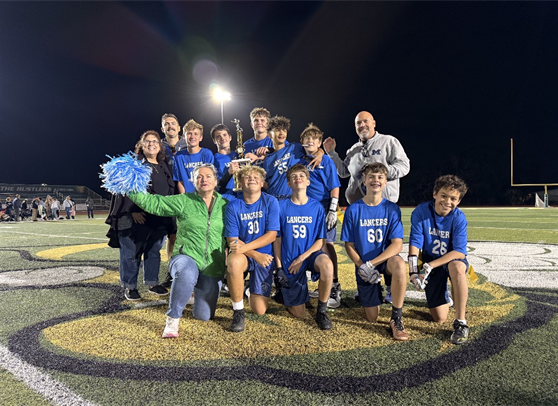 Catholic Youth Sports flag football team with a trophy