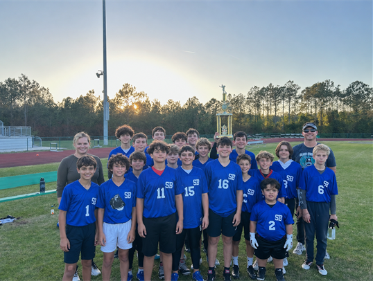 Catholic Youth Sports flag football team holding a trophy