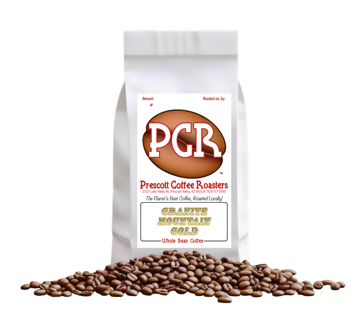 White coffee bag labeled “PCR” Granite Mountain Gold with coffee beans scattered in front on a white background