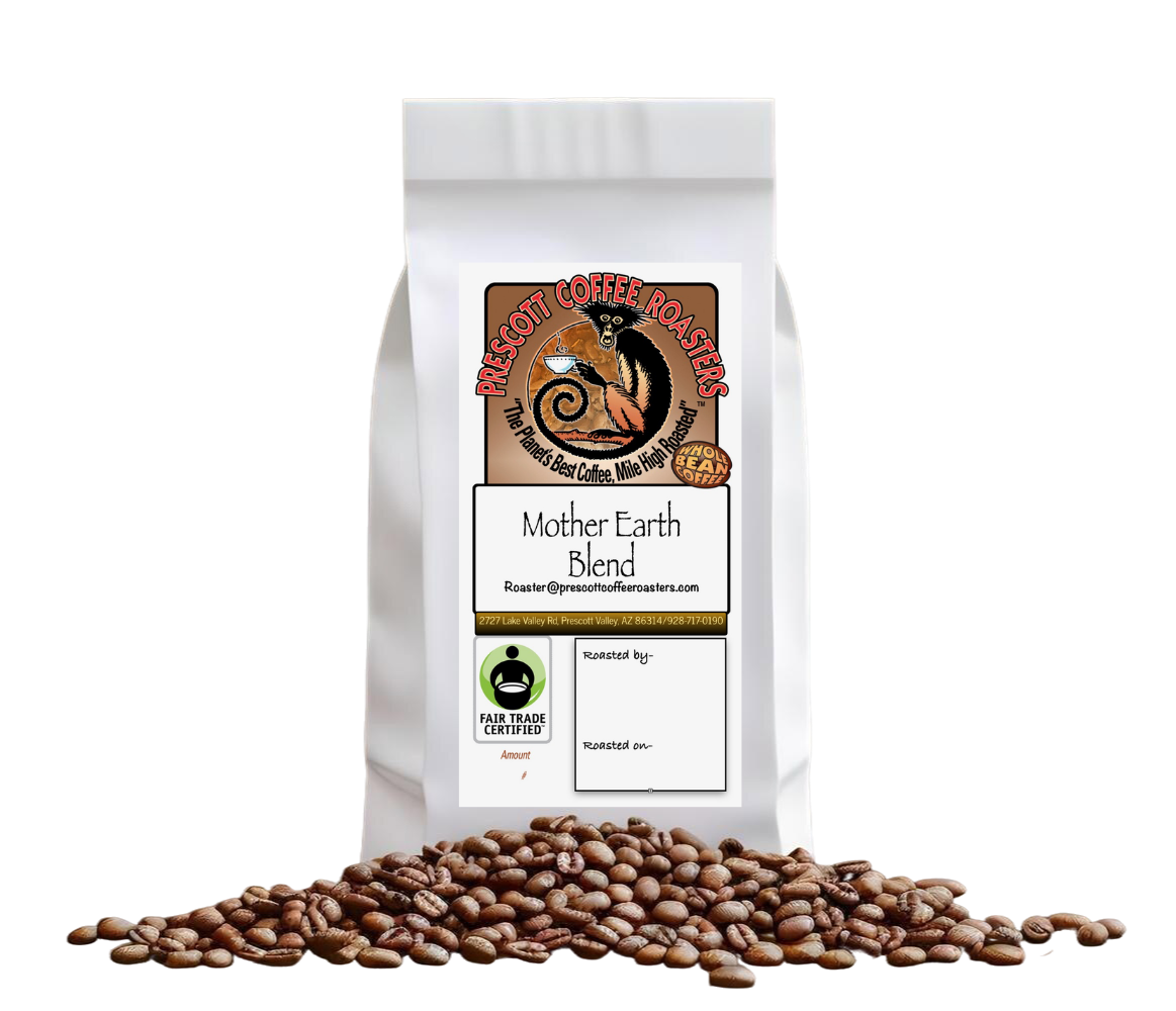 White coffee bag with Mother Earth Blend logo, standing on scattered coffee beans on a plain background