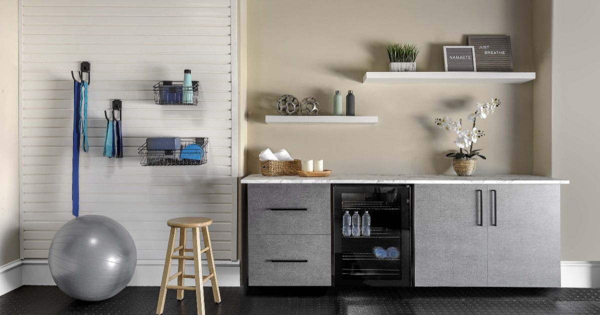 Walk-in closet with white shelving, clothes hanging, drawers, and shoes.