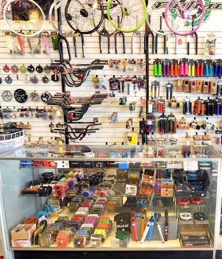 A store filled with lots of bicycle parts and bicycles.