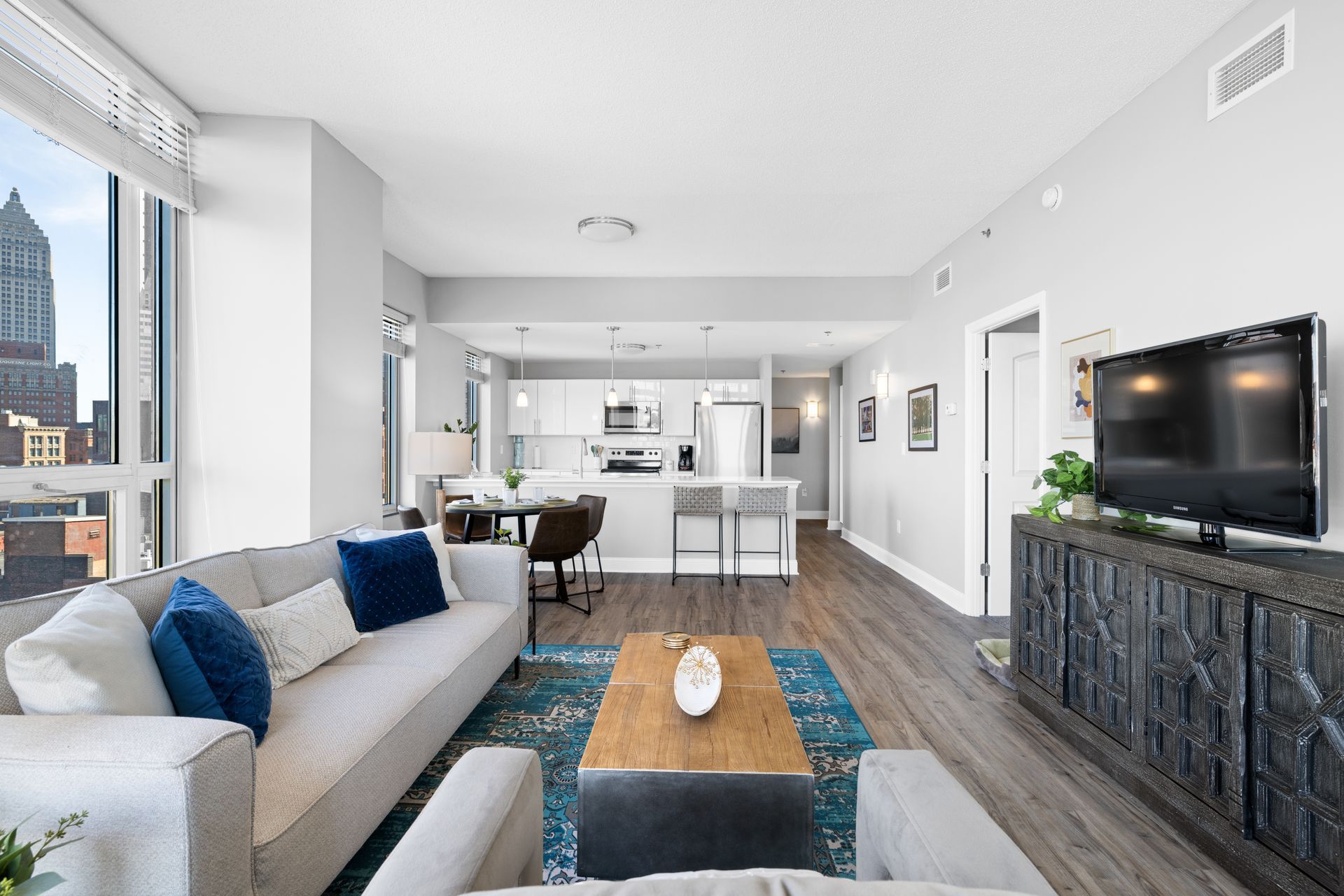 A living room filled with furniture and a flat screen tv.
