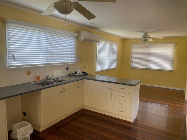 White Blinds In The Kitchen