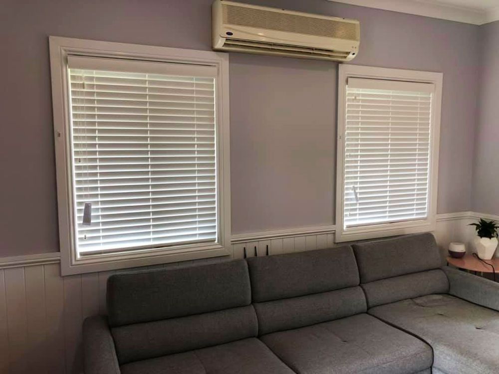 Living Room With White Blinds 