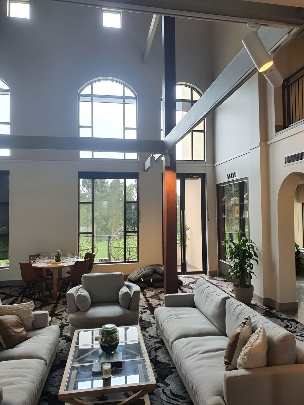 A House With A Grey Couch — Entire Power Solutions In Broadmeadow, NSW