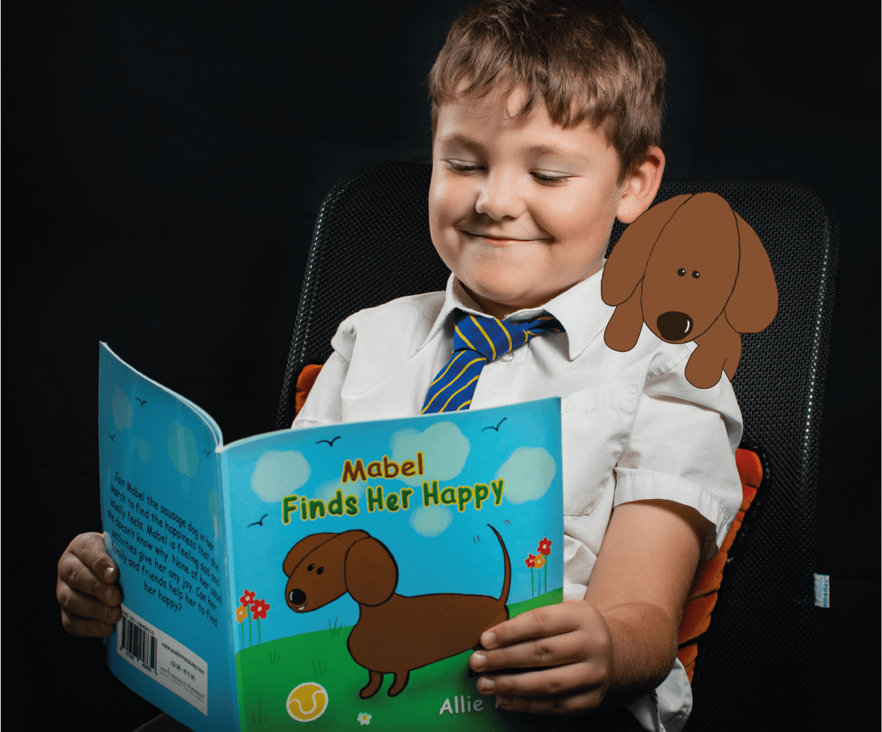 A young boy is reading a book called mabel finds her happy