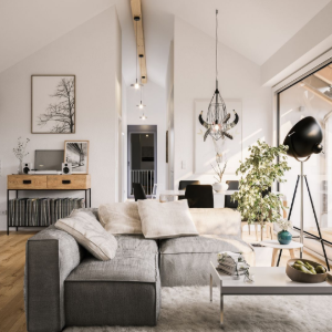 Bright minimalist living room with gray sectional, white walls, wood accents, and large windows.