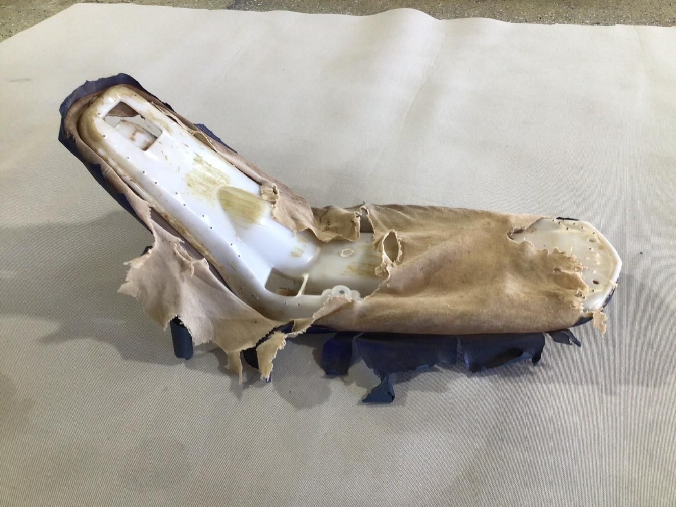A Piece of Fabric is Laying on a White Surface — Isa Auto Glass & Upholstery In Menzies, QLD