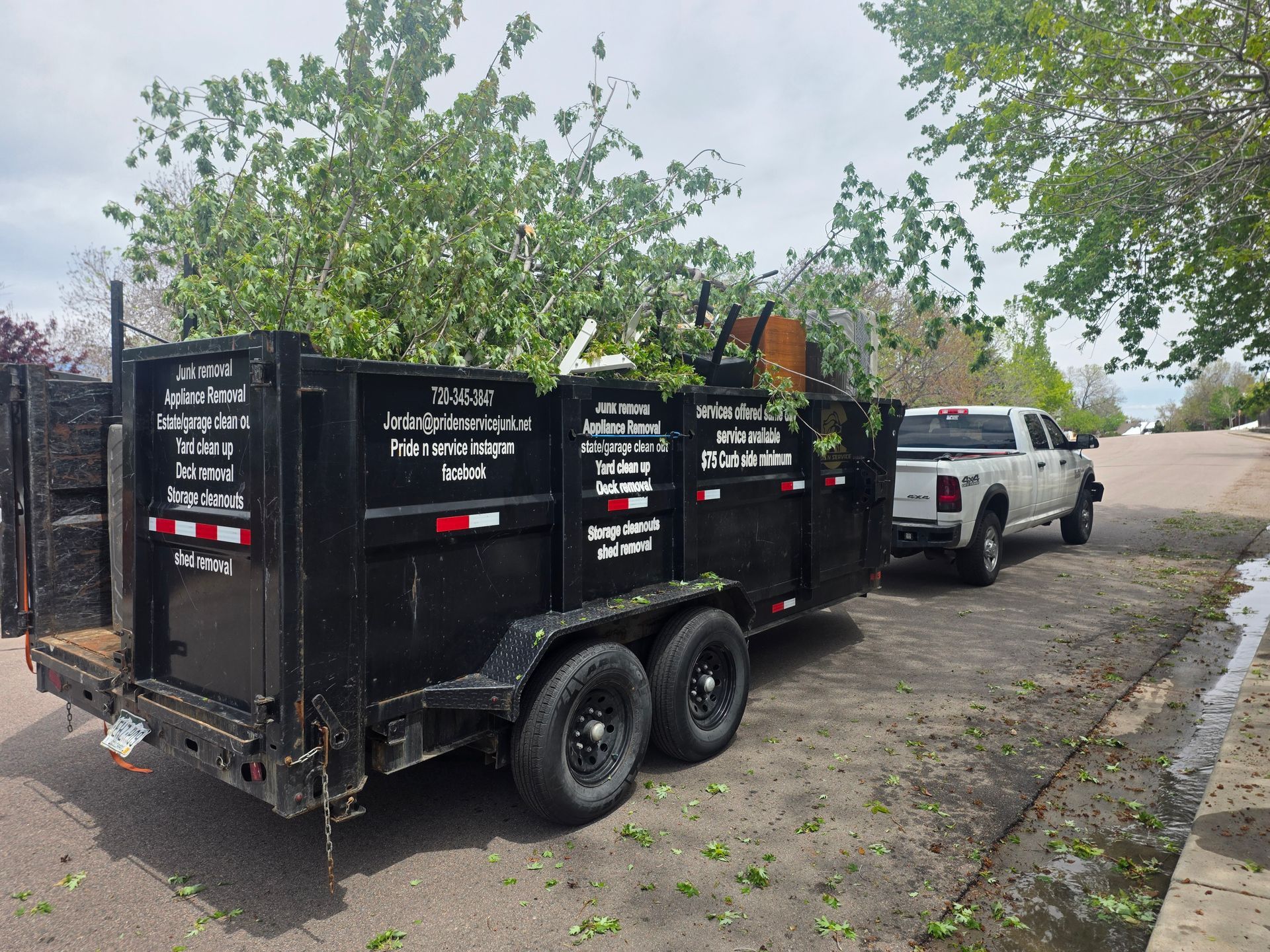Trailer parked hauling junk