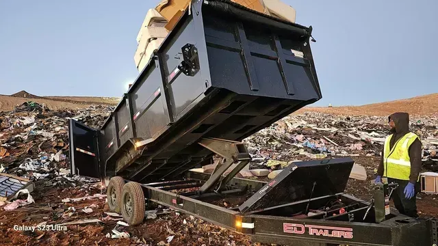 Dump truck unloading junk