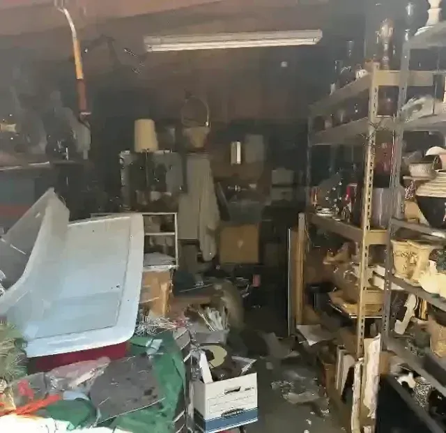 Cluttered garage storage shelves