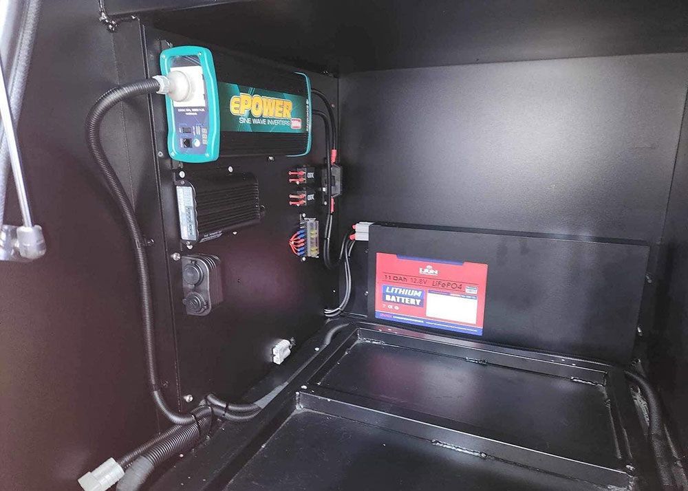 Car Battery Positioned on the Boot of a Vehicle — Lavington Auto Electrical in Lavington, NSW