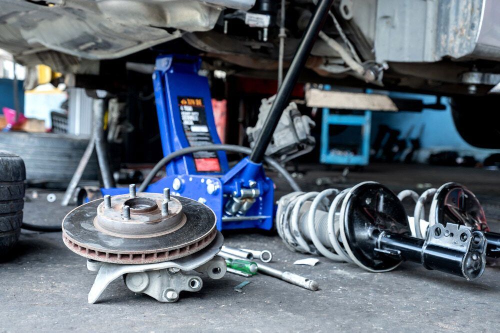 Disassembled Car Brakes and Suspension in Precise Detail at Lavington Auto Electrical 