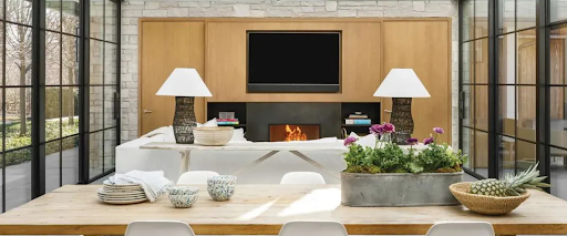 Modern home office with large windows, styled for home office trends.