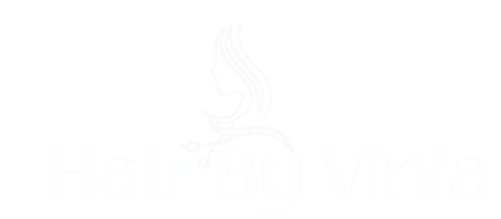 Hair by Vinia Faint white logo of a stylized flame or swirl on a white background