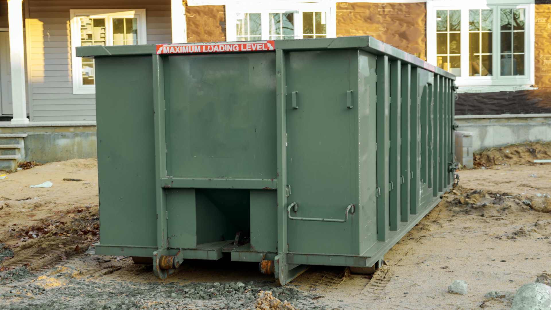 Heavy duty dumpster used for concrete and material disposal job
