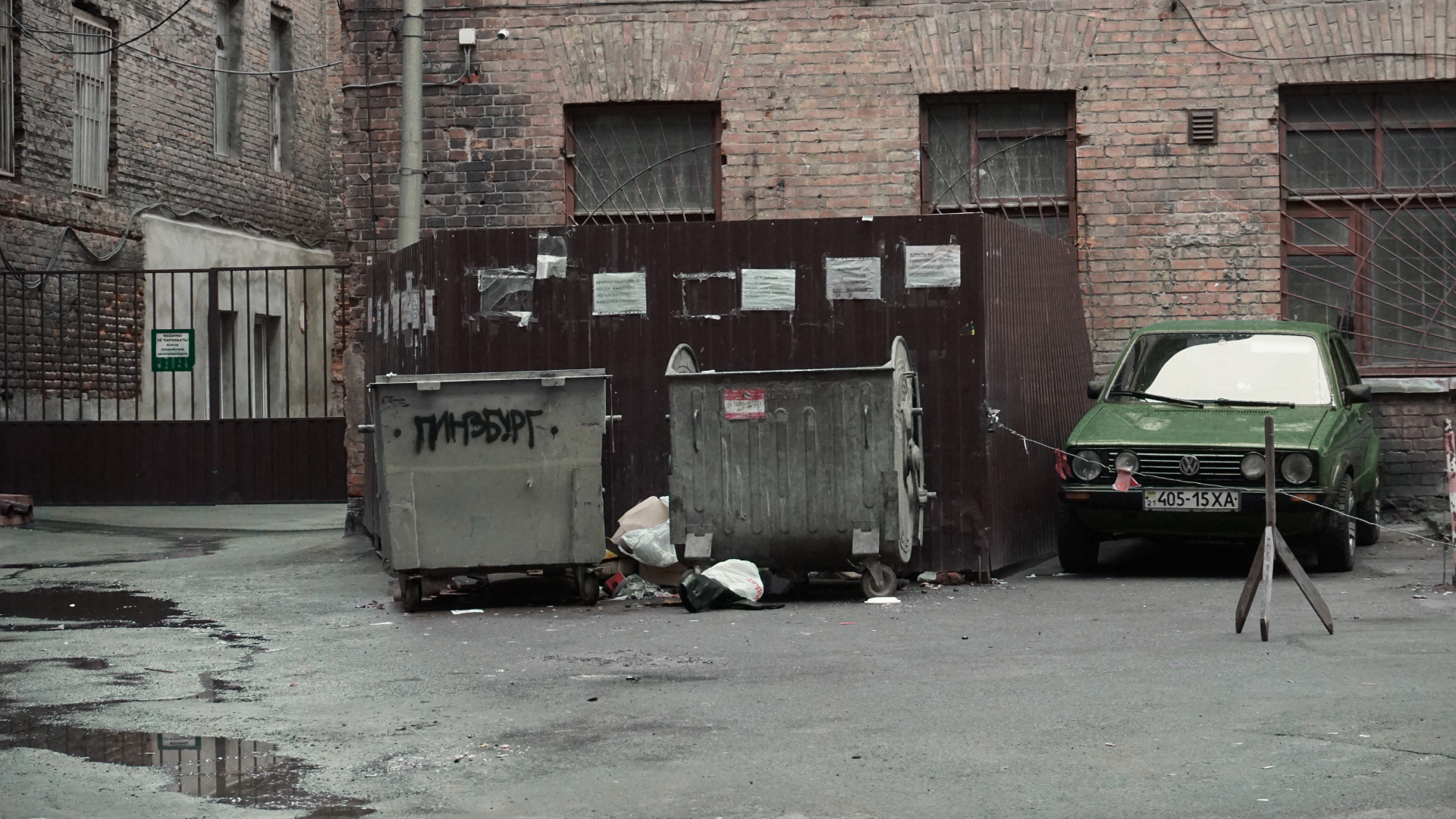 Construction dumpster rental placed beside new building project site