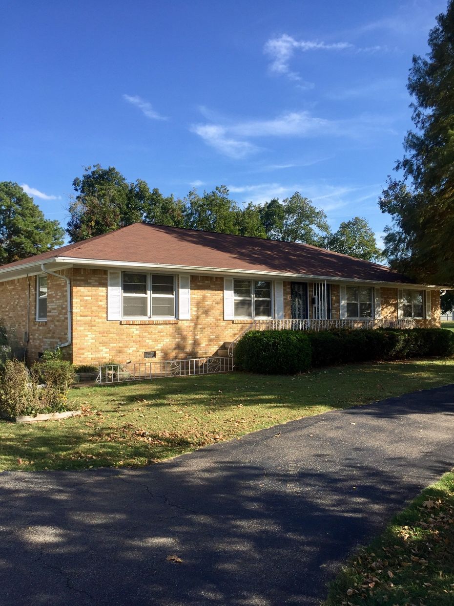 brick, one story house