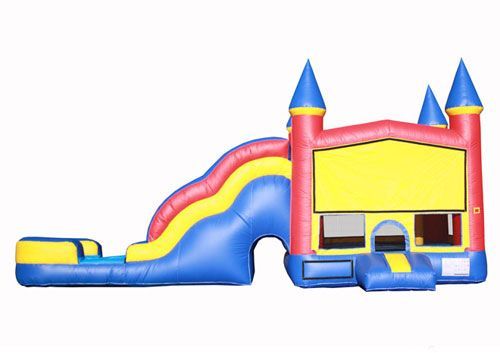 Colorful inflatable bounce house with slide, castle turrets, and yellow entrance