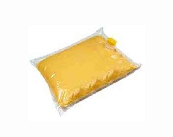 Yellow pillow sealed in clear plastic packaging