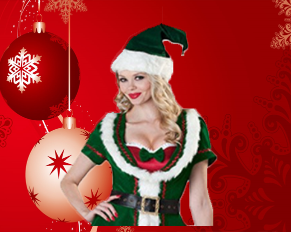 Woman in a festive green-and-red Santa outfit against a red holiday background with ornaments.