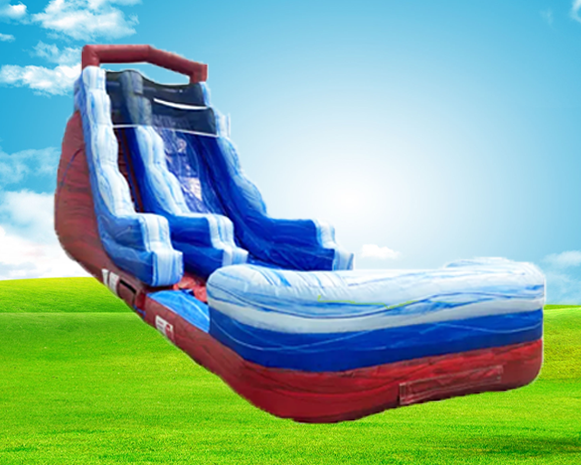 Blue and red inflatable water slide on a grassy field under a bright sky