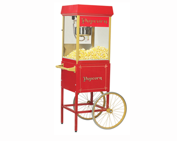 Red popcorn cart with glass case, yellow popcorn inside, and large wheel on the side