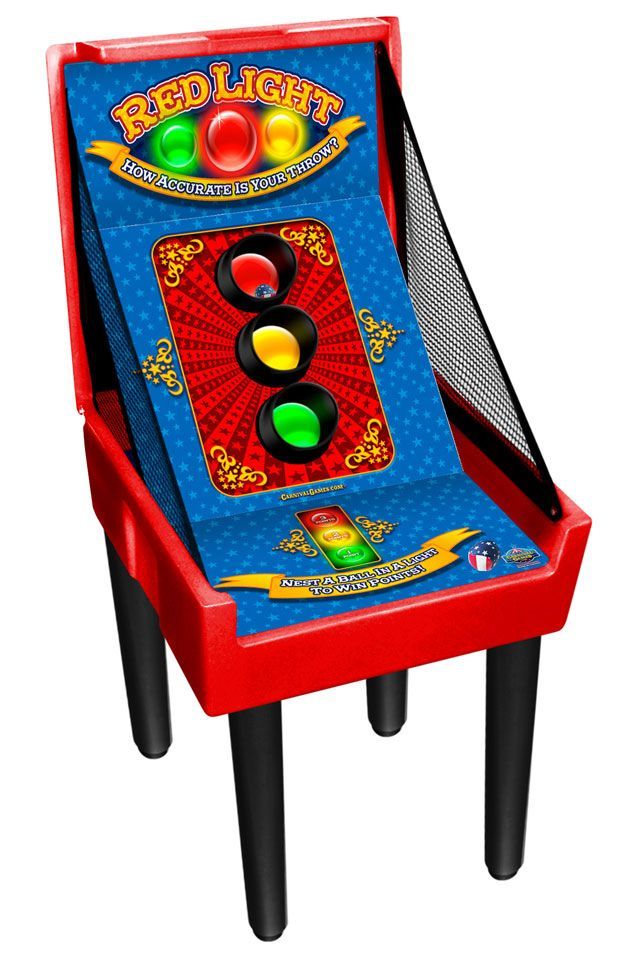 Red arcade-style traffic light game cabinet with red, yellow, and green lights on a slanted panel.