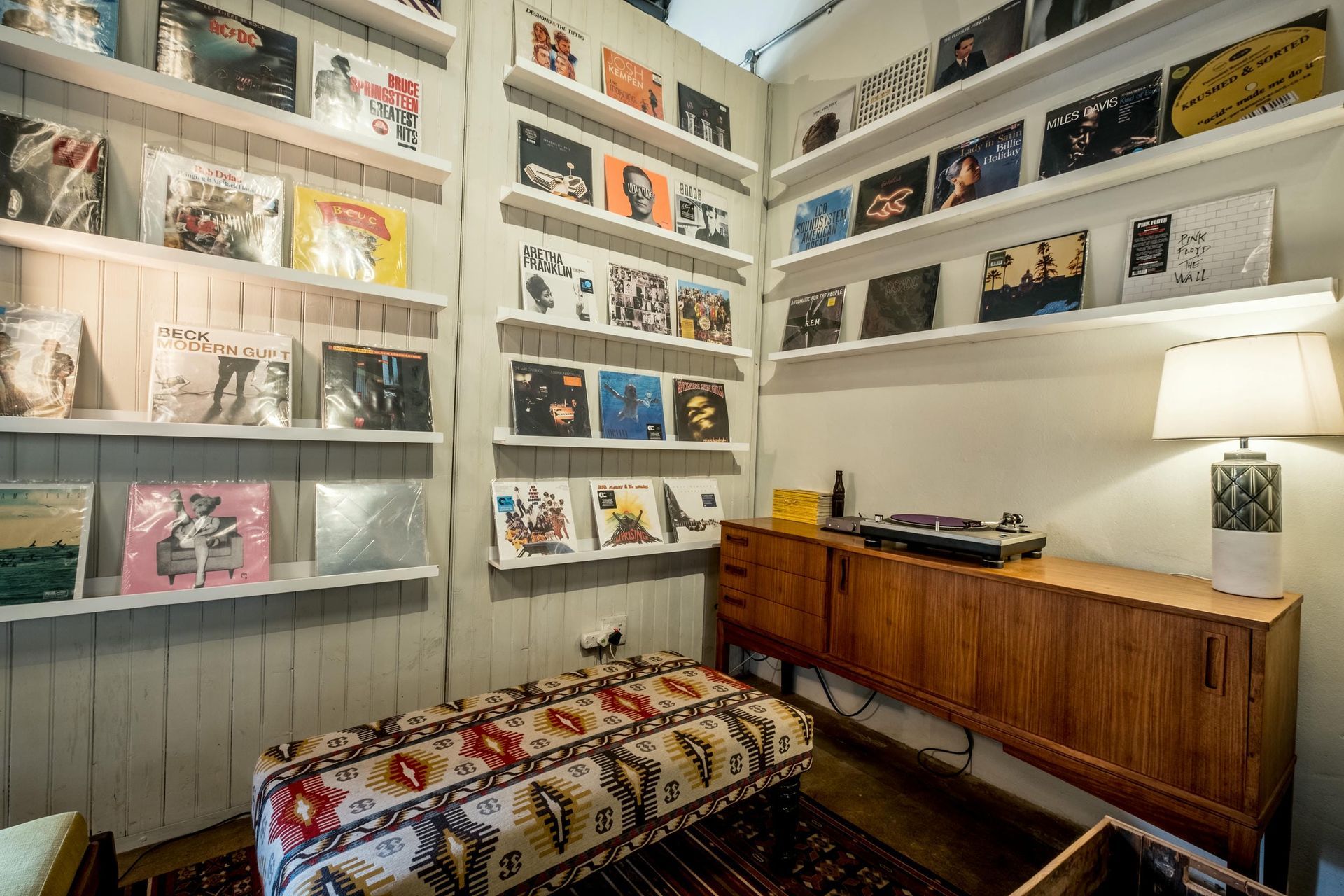 There are many records on the shelves in this room.