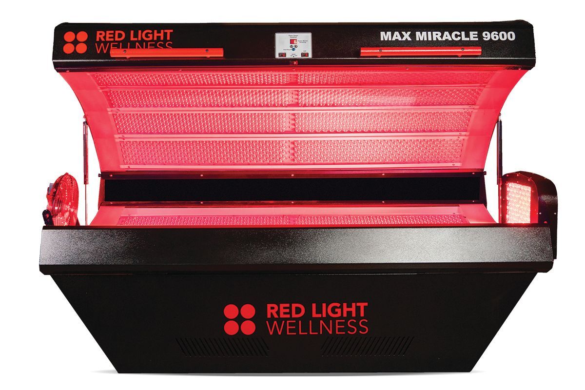 Red Light Wellness MAX MIRACLE 9600 red light therapy panel, open and glowing red