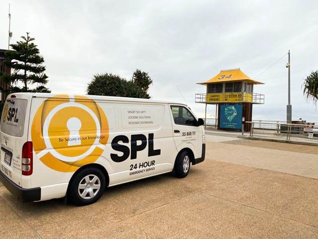 Photo of SPL Security Solutions Truck on Beach — SPL Security Solutions In Gold Coast, QLD