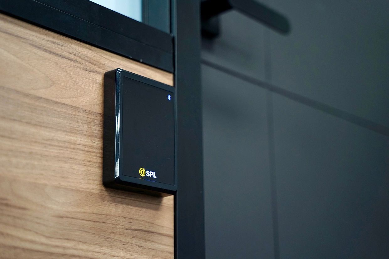 A Close Up of a Black Box on a Wooden Wall — SPL Security Solutions In Tweed Heads, NSW
