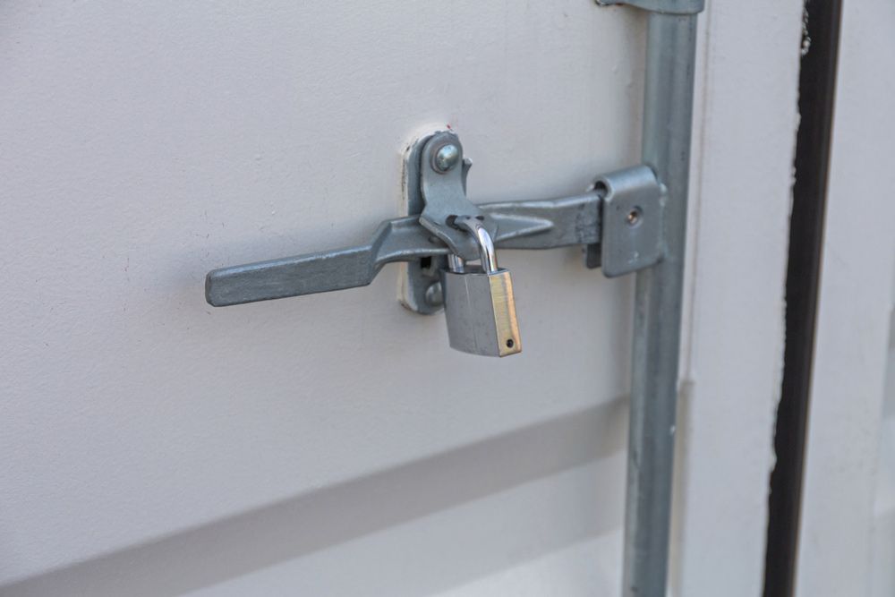 Door With A Padlock On It — SPL Security Solutions In Ashmore, QLD