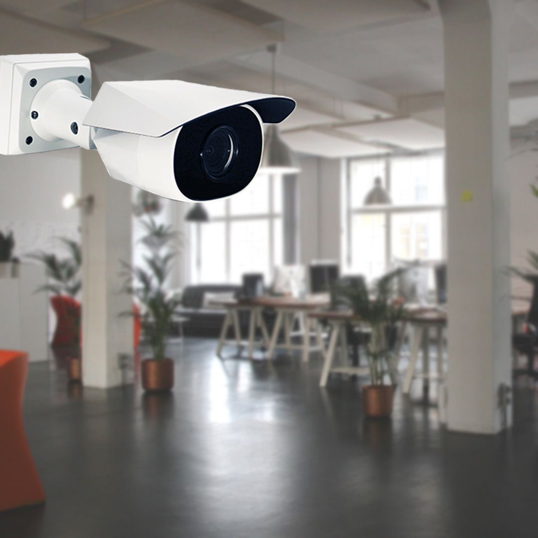 A Security Camera is Mounted to a Wall in an Office — SPL Security Solutions In Southport, QLD