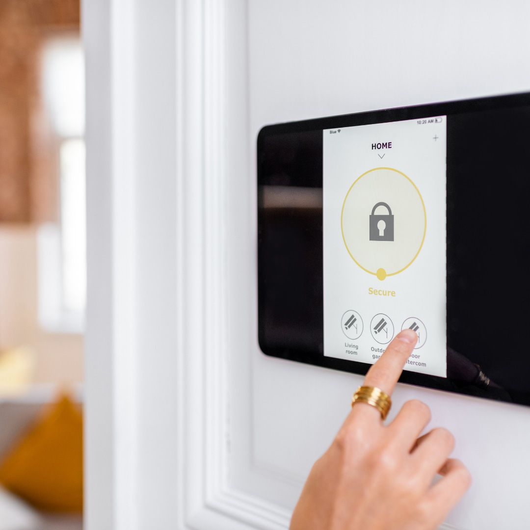 A Person is Pointing at a Screen With a Padlock on It — SPL Security Solutions In Yatala, QLD