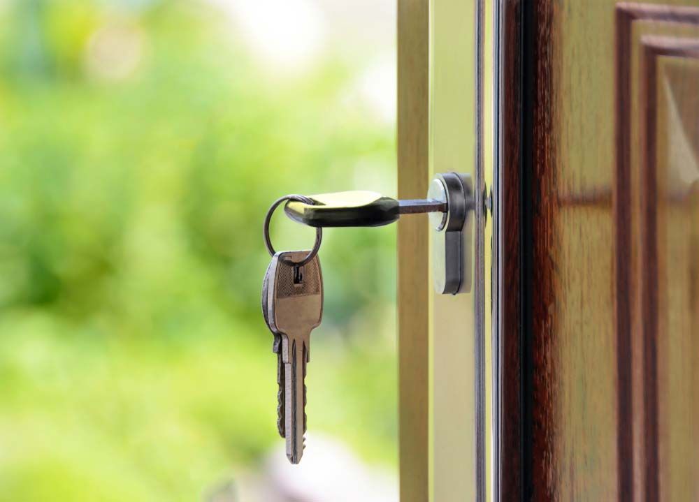 Open Door With Key in Door — SPL Security Solutions In Bundall, QLD