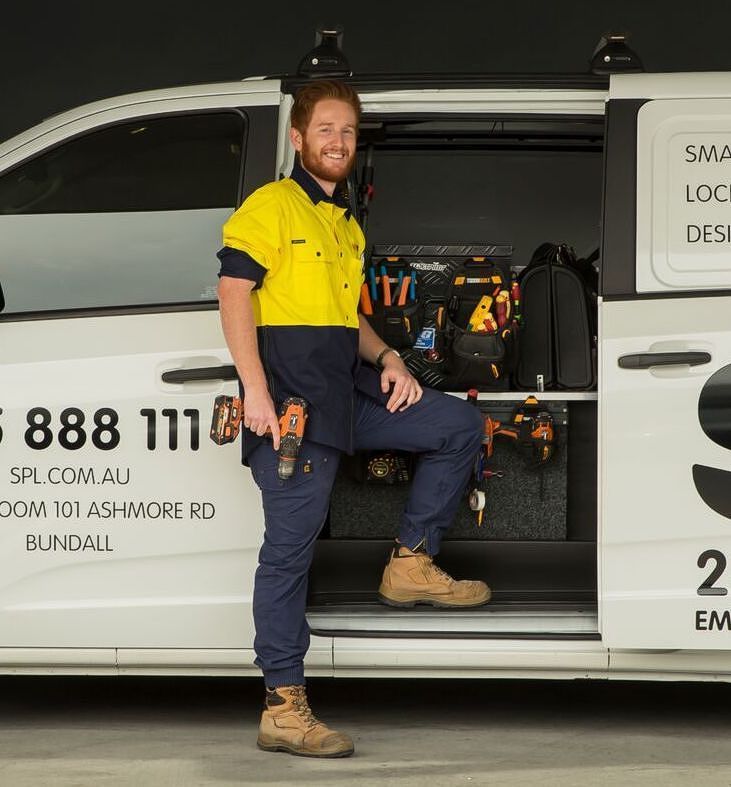 Security Expert Standing at Branded Truck — SPL Security Solutions In Northern NSW, NSW