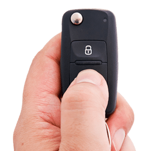 Hand Holding Automotive Battery Car Key — SPL Security Solutions In Tweed Heads, NSW